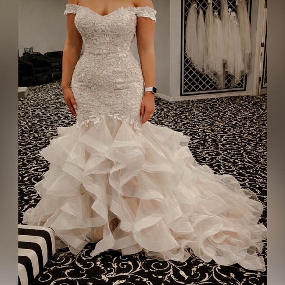 I am not sure, I will have to look. Dresses & Skirts - Wedding Dress